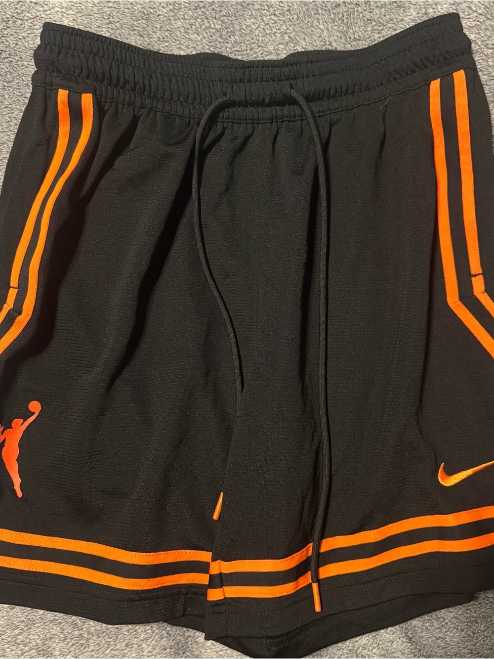 Nike Women’s Black Athletic Shorts with Orange Accents